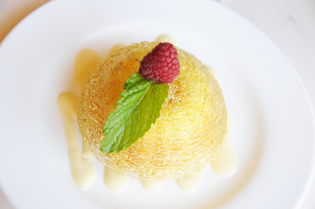 Our fresh lemon cake mixes the perfect amount of tart with sweet, topped with a pure sugar dome and raspberry. Mmmm...