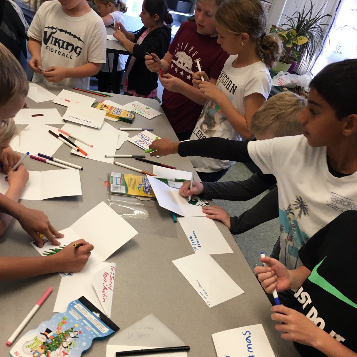 cwallace_cathy's tweet photo. Stoneridge Timberwolves making Christmas cards for Jacob. Thank you Student Leadership Club for helping! #rcsdchampions https://t.co/BJgHPlmItF