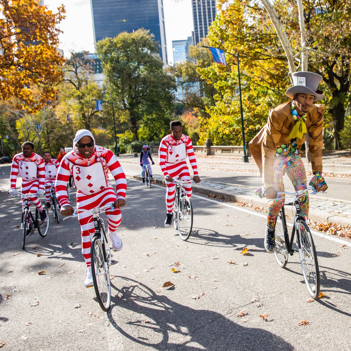Pirelli's tweet photo. Meanwhile, in Central Park, the #MadHatterRide cycled to the Alice's Adventures in Wonderland sculpture to celebrate the 2018 #PirelliCalendar unveiling. #InTheCal https://t.co/TIMfv1xibp