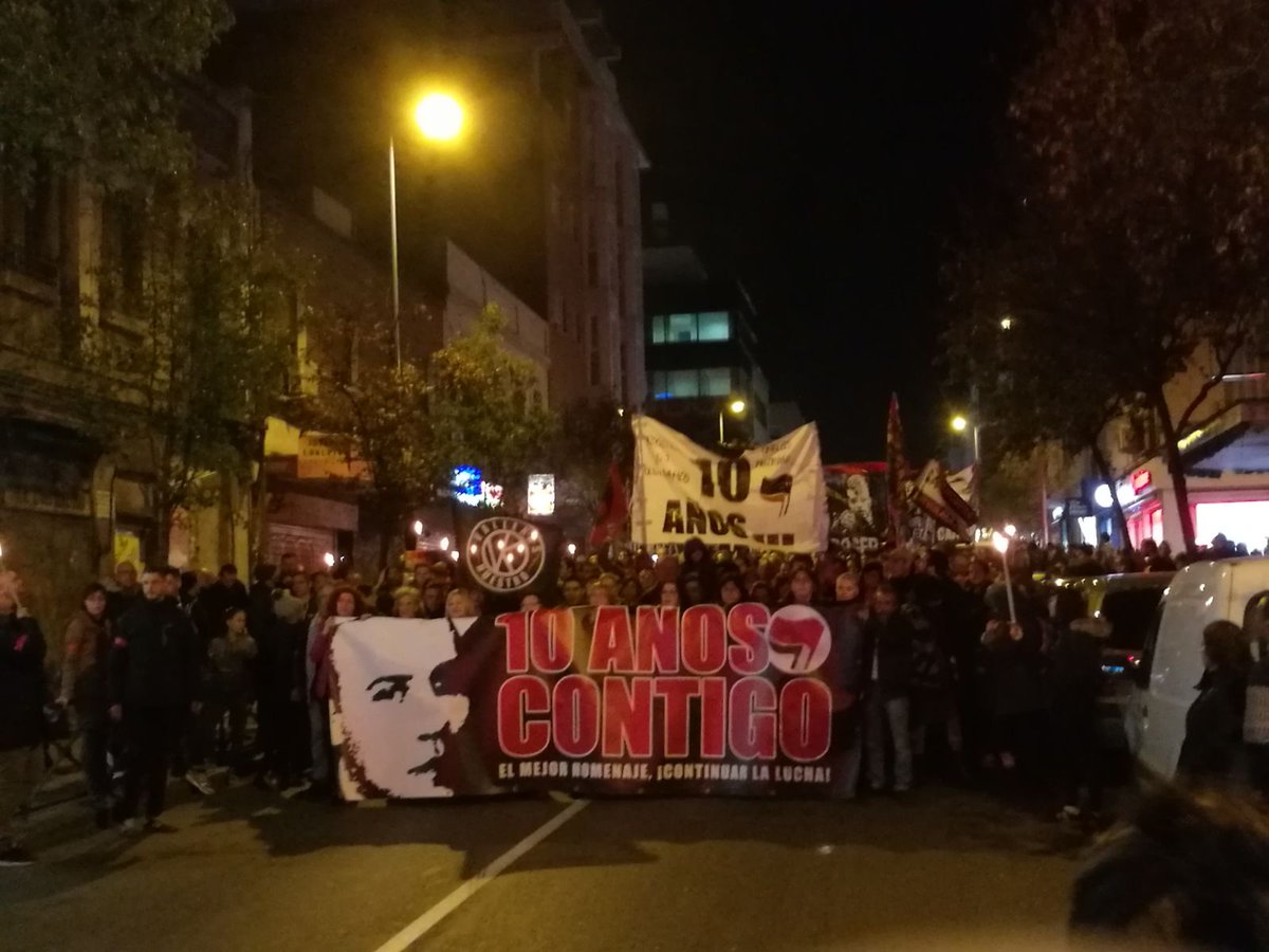 UJCE_cc's tweet photo. Diez años sin ti, diez años contigo. Presentes en la manifestación para demostrarles que el mejor homenaje es continuar la lucha. #CarlosVive https://t.co/jazDn6OVA5