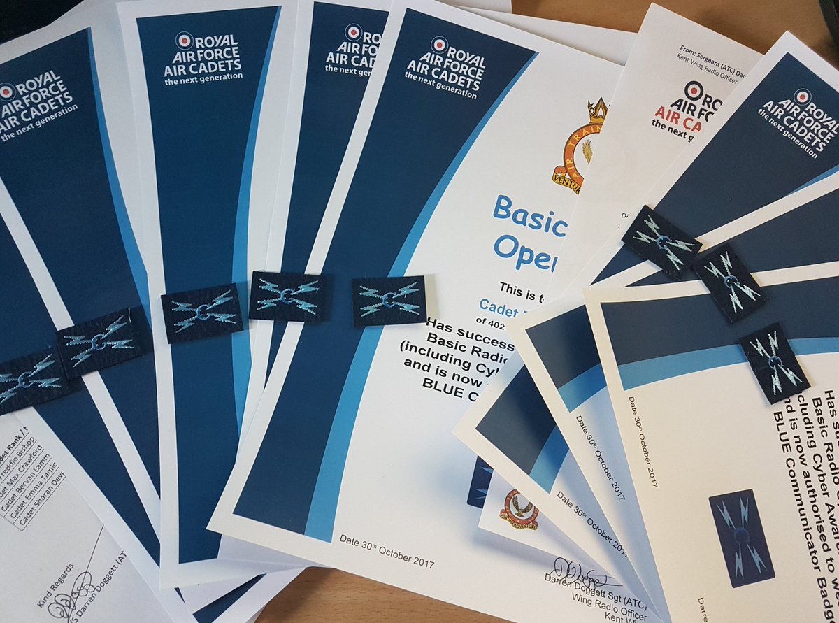 Some basic radio operators certificate and badges ready to be posted out to Squadron's