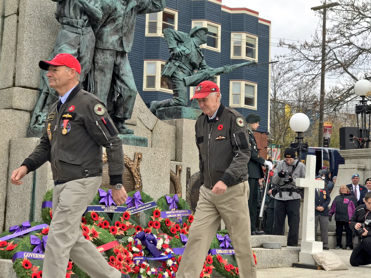 GerriLynnMackey's tweet photo. Representatives of #vimyflight project (who are visiting the province with the replica WW1 Biplane, 'Lucie') laying a wreath at the National Memorial in St John's. It's the same wreath they laid at Vimy Ridge in France, on April 9th. @VOCMNEWS https://t.co/yYJOdeJjel
