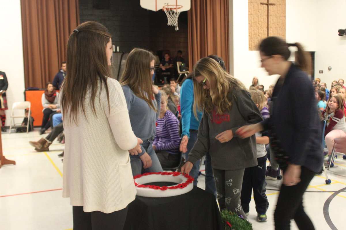 Monsignor Uyen students remember through liturgy and placing of poppies led by our Grade 7/8 classroom.