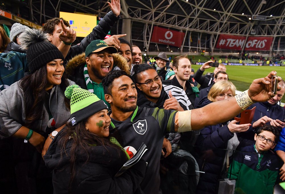 Love this photo from <a href="/sportsfile/">sportsfile</a> as <a href="/bundeeaki12/">Bundee Aki</a> celebrates one hell of a debut with his family