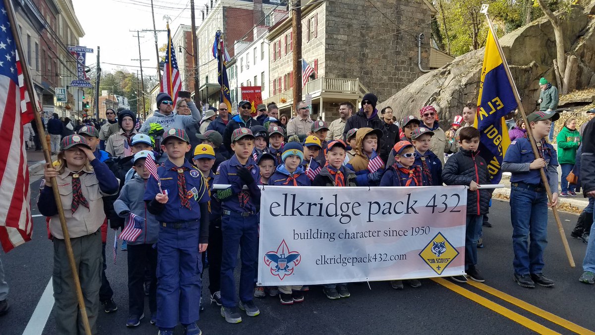 ECStrong5k's tweet photo. The pack that brought you the #ECSTRONG5k was proud to participate in the #ellicottcity veterans day parade today on Main St! @VisitECMaryland #ThankAVet #beascout https://t.co/CNKQmvDKs2