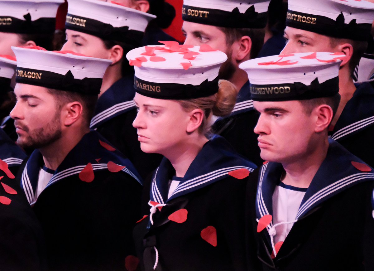PoppyLegion's tweet photo. The poppies fall silently on to the heads of those who are serving as HM The Queen observes #FestivalOfRemembrance https://t.co/nwrrrmo1F5