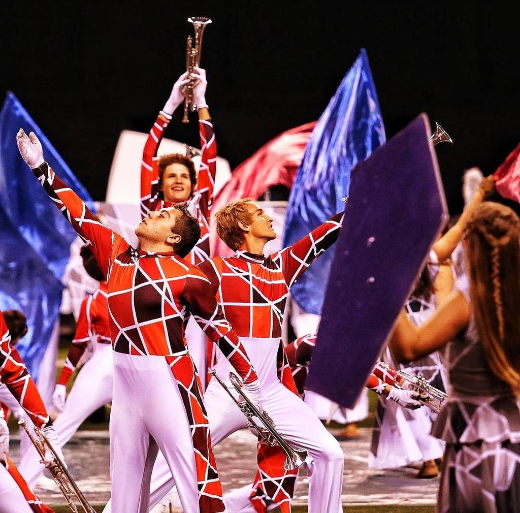 BANDSOFAMERICA's tweet photo. Flower Mound H.S., TX  brought Gaudi to life with all that color! Absolutely stunning! 
#boa2017 https://t.co/uxWj1n1LmM https://t.co/roRsPrMlSl