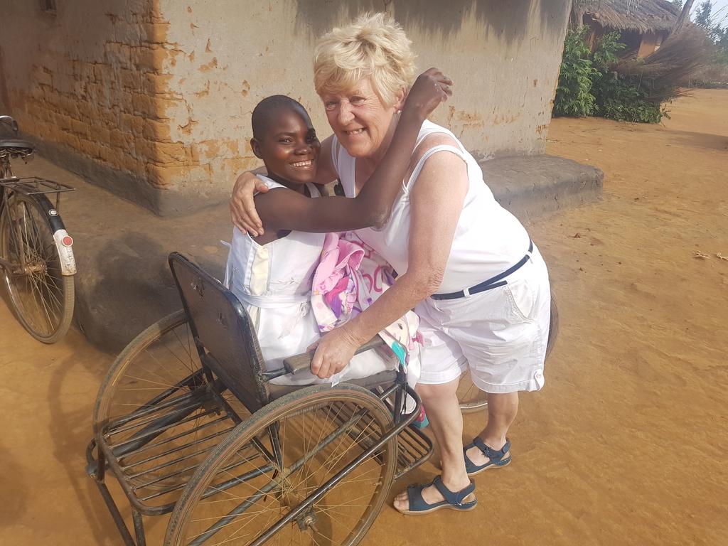 ercmalawi2017's tweet photo. Betty and Princess. Betty gifted her this chair to improve her standard of living. 
#equality https://t.co/I0FPbRyMMN
