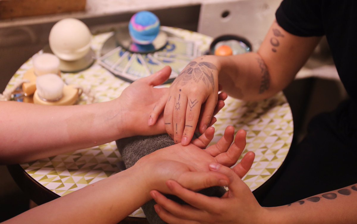 Luna is doing some of our Lush palm reading from The Planets treatment 🌎🌌 #LushSpa