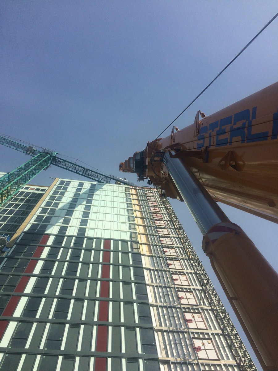 bighook19's tweet photo. Downtown Hamilton dismantling this tower crane. #workingallweekend #cranelife https://t.co/zYJ8vgoUUx