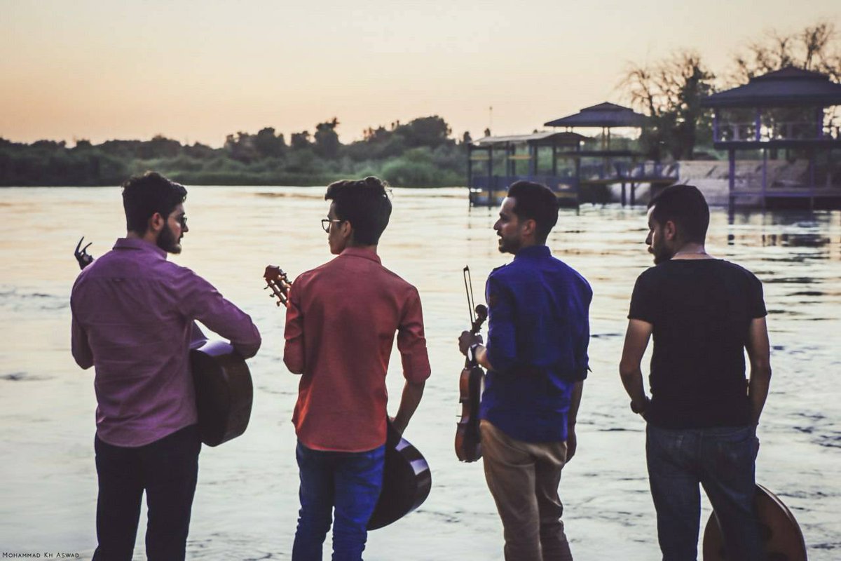 RudiVranckx's tweet photo. Deze foto kregen we in onze inbox, enkele weken geleden: vier jonge muzikanten uit Mosul, aan de oever van de Tigris, met hun nieuwe instrumenten Wie de docu nog niet gezien heeft, dat kan hier: https://t.co/ONNwNyQugN #ImagineMosul https://t.co/49PQ9AyzcI