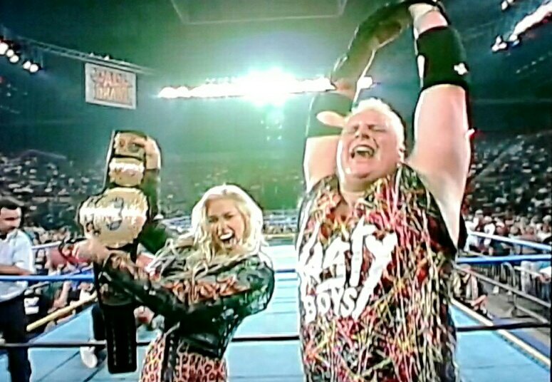 Mundo840's tweet photo. Roma hits a splash from the top. But the ref's back is turned, so Saggs hits an elbow from the top for the win. New tag champs, The Nasty Boys!!! Then Jesse interviews the new champs #FallBrawl93 https://t.co/jL8KDnJFZG