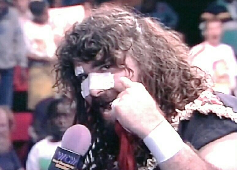 Mundo840's tweet photo. A Cactus Jack video is shown talking about the injury he sustained by Vader. I loved this rivalry!!! #FallBrawl93 https://t.co/JZSLPBPZXM