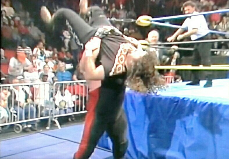Mundo840's tweet photo. A Cactus Jack video is shown talking about the injury he sustained by Vader. I loved this rivalry!!! #FallBrawl93 https://t.co/JZSLPBPZXM