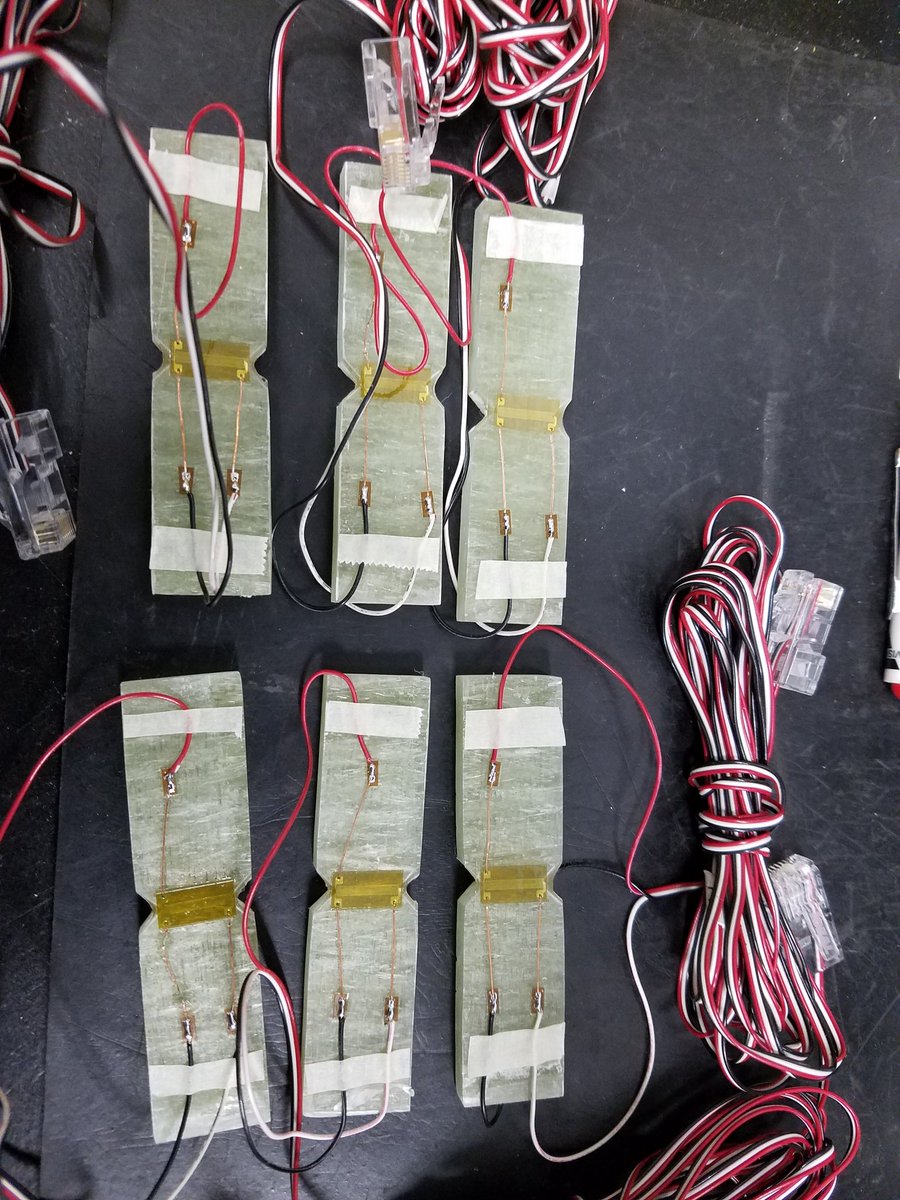 Shear testing D5379 double v-notched specimens ready for testing #shearmoduluswithstraingages