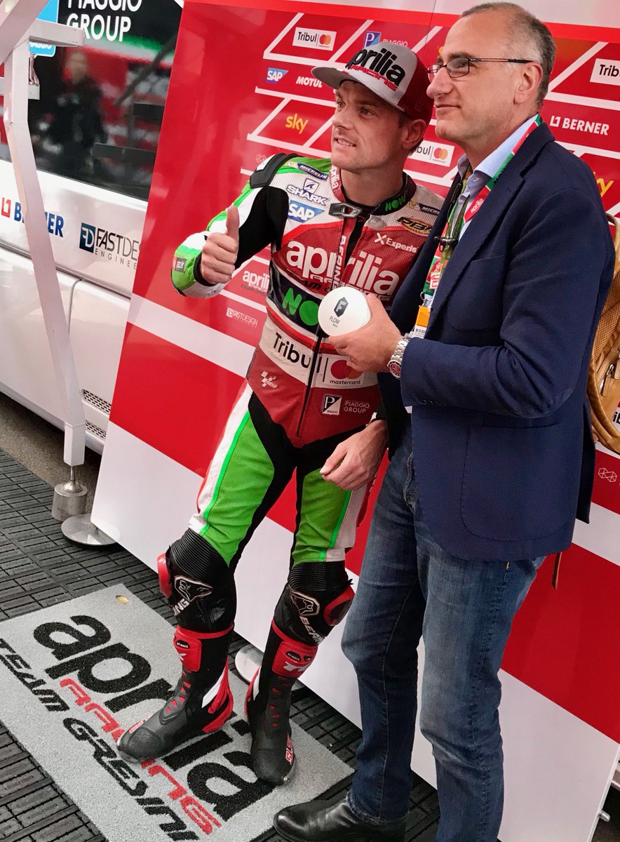 BrunelloBinetti's tweet photo. Curtail call at #MotoGP #ValenciaGP To the fantastic team @ApriliaOfficial thank you so much in particular to @SamLowes22 for his courtesy.See you again next season with @everyware_IoT platform! @BacktoWork24 #RideRed #Red https://t.co/5tn3OAimg8