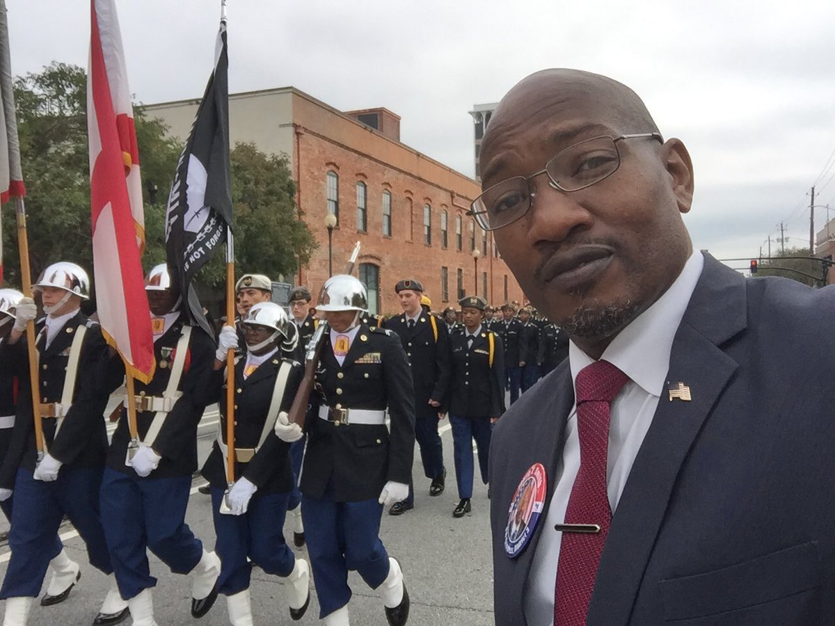 Jesse_TSmith's tweet photo. It felt great walking and talking with veterans, and citizens who came out to support the men & women who fought for this great nation. Contrary to popular belief, love for country is determined by the support for veterans. #alpolitics #Smith4Congress #VeteransDay2017 https://t.co/i6DckbiJUR