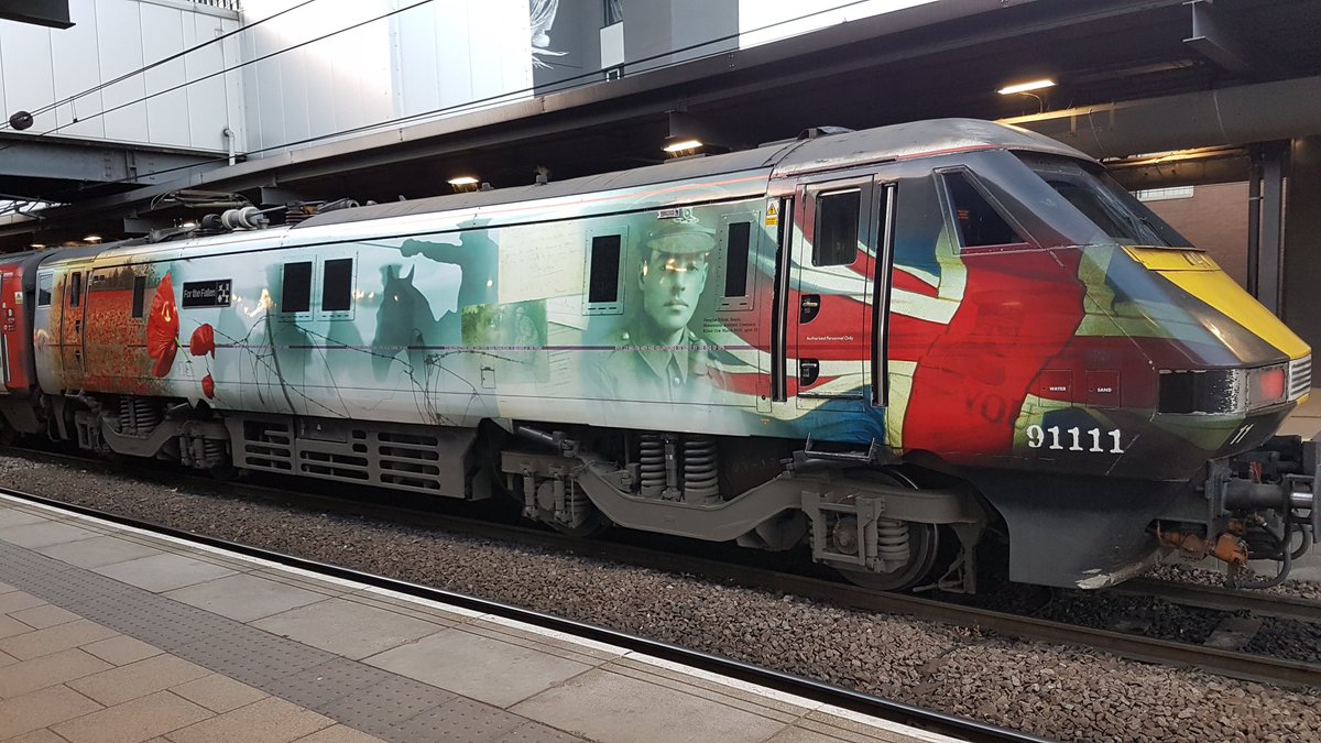 jdmitchell1980's tweet photo. Quite an appropriate train to see at Leeds station station today. @Virgin_TrainsEC #RemembranceSunday #Virgin91111 https://t.co/fEddntcwD9
