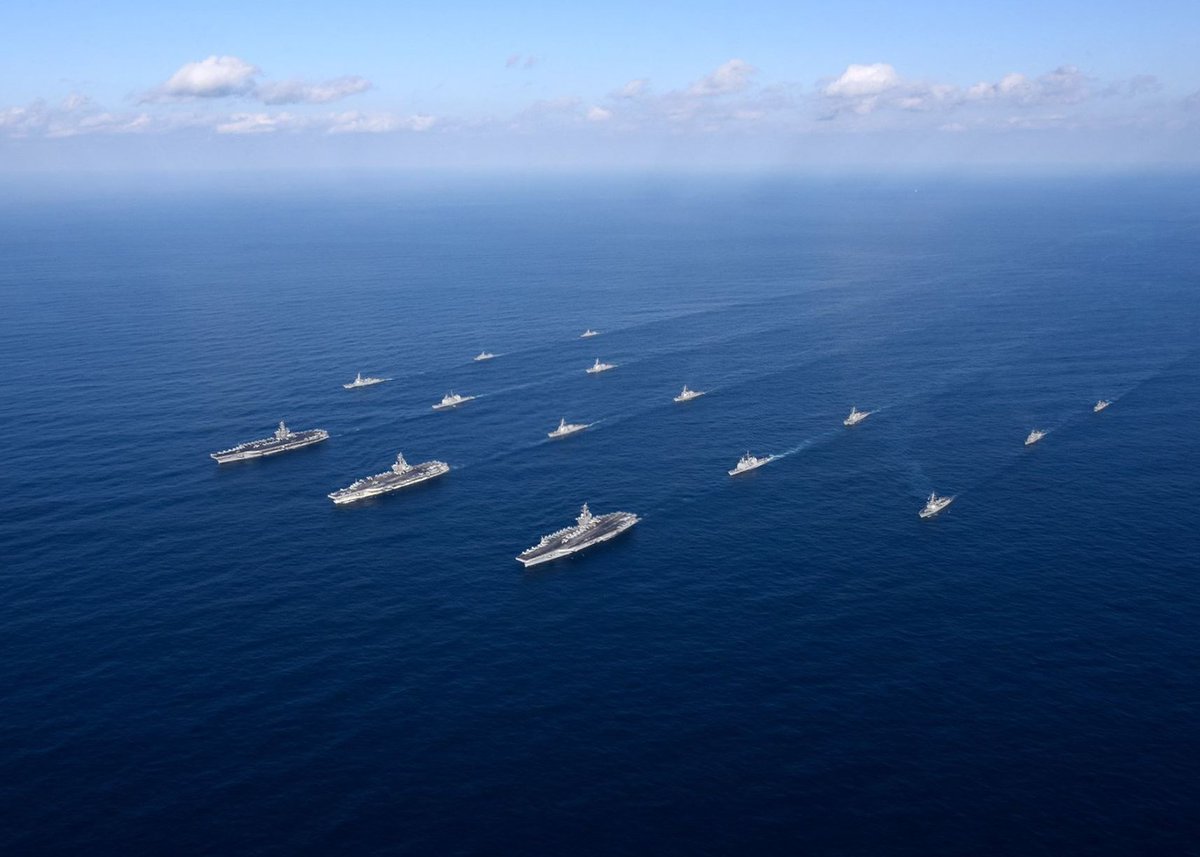 USPacificFleet's tweet photo. Ships of the USS Ronald Reagan (CVN 76), USS Theodore Roosevelt (CVN 71) and USS Nimitz (CVN 68) strike groups and Republic of Korea Navy sail together, Nov. 12, during a three-carrier strike force exercise in the Western Pacific. @US7thFleet https://t.co/n9gH6jfnpD