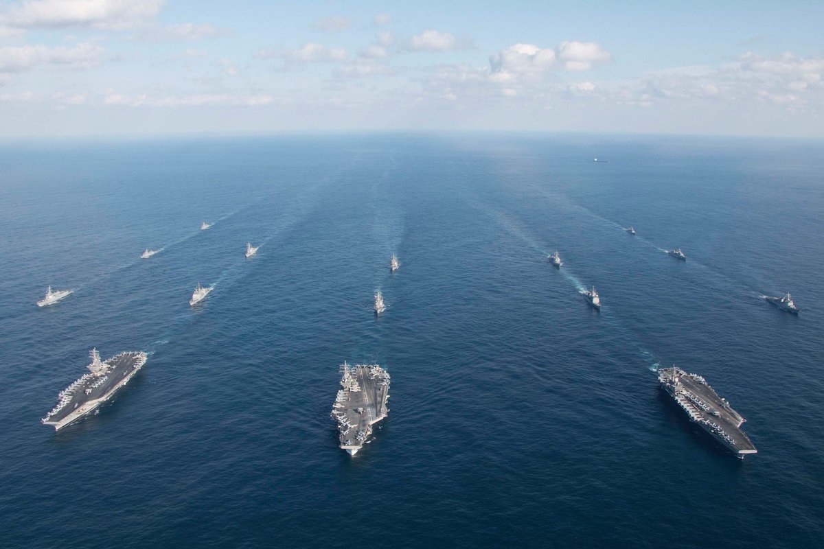 USPacificFleet's tweet photo. Ships of the USS Ronald Reagan (CVN 76), USS Theodore Roosevelt (CVN 71) and USS Nimitz (CVN 68) strike groups and Republic of Korea Navy sail together, Nov. 12, during a three-carrier strike force exercise in the Western Pacific. @US7thFleet https://t.co/n9gH6jfnpD