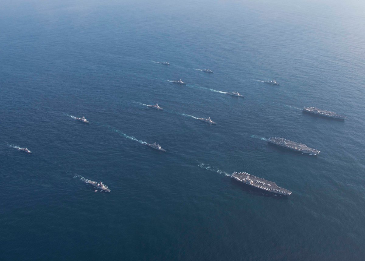 USPacificFleet's tweet photo. Ships of the USS Ronald Reagan (CVN 76), USS Theodore Roosevelt (CVN 71) and USS Nimitz (CVN 68) strike groups and Republic of Korea Navy sail together, Nov. 12, during a three-carrier strike force exercise in the Western Pacific. @US7thFleet https://t.co/n9gH6jfnpD