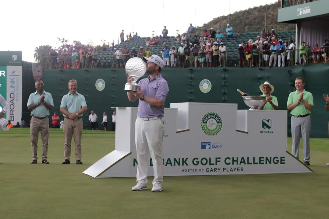 This is what victory tastes like! Our newest South African hero, Branden Grace receives the coveted crystal trophy and $1.25mil off course! #NGC2017