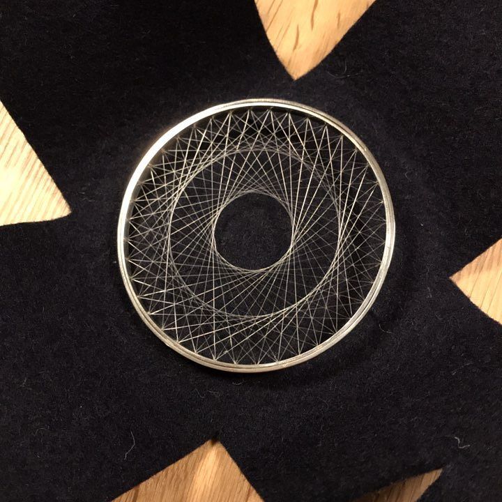 JeanneMarell's tweet photo. Packed up and (almost) ready to ship to its new owner, this double weave Spirograph brooch in Fairtrade silver. On… https://t.co/uEH8zNzJ4t https://t.co/53Bt8fHlf0
