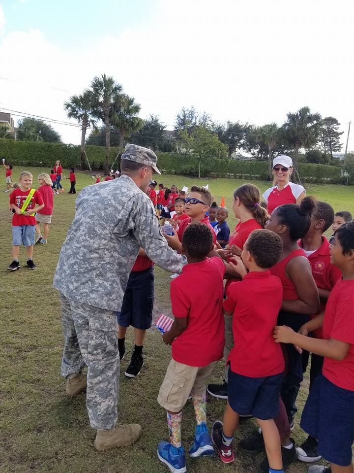 MsbrownICCS's tweet photo. Sgt Scott Martin was our special guest of honor at ISCC  school parade Friday celebrating#citizenship, #bravery, #gratitude! https://t.co/OVHgEOIP9R