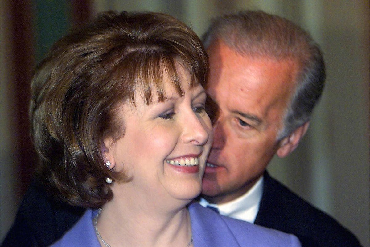 Why must former Vice President Joe Biden habitually smell the hair of the women, little girls, and babies he meets?