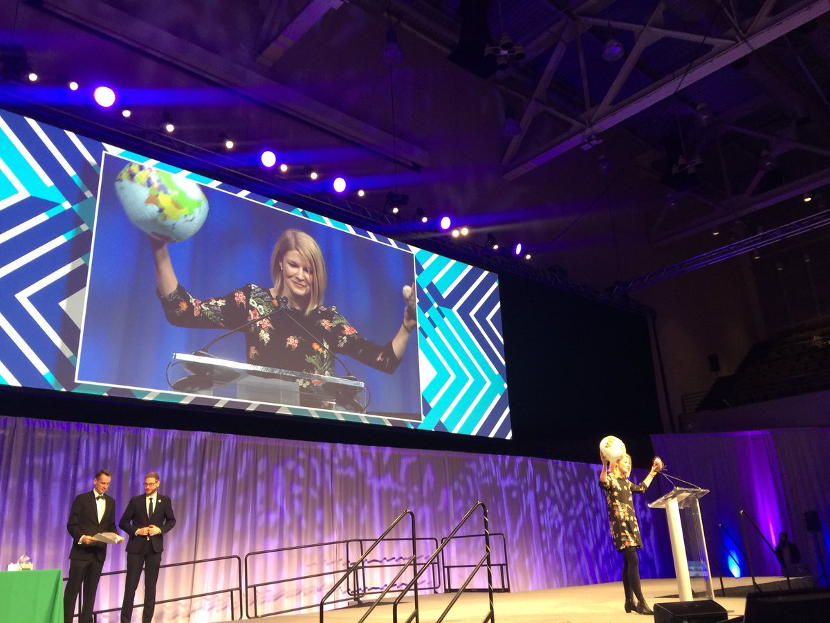 iGEM's tweet image. @meganjpalmer on stage to present the #HumanPractices award! #iGEM2017 #GiantJamboree #ClosingCeremony