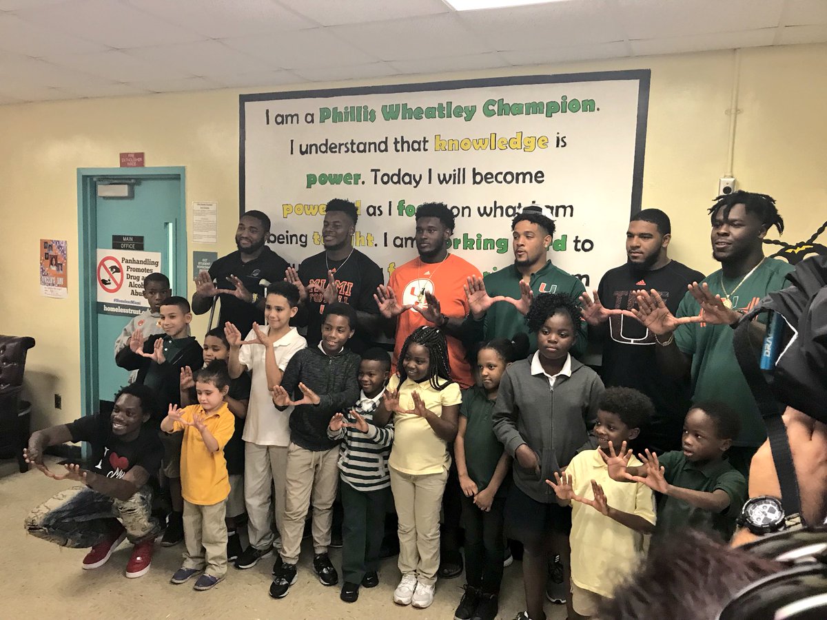 CanesFootball's tweet photo. Led by Demetrius Jackson, through his non-profit Young Men of Tomorrow, several Canes delivered turkeys in Overtown today. https://t.co/4o0MFZUdU6