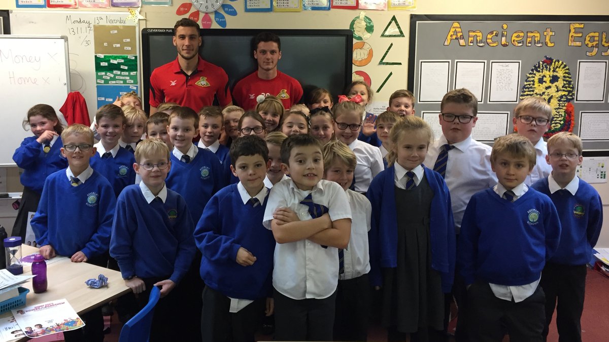 ROVERS ROADSHOW DRFC players and visited Auckley Primary School on