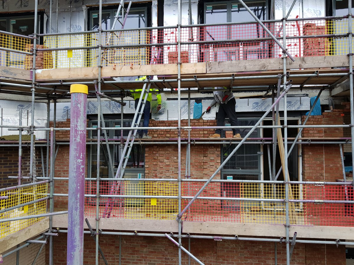 aca_studiosltd's tweet photo. Our brick patterns and detailing are starting to emerge through the scaffolding at Loampit #sitevisit #Purelake Group @PeabodyLDN @familymosaic #Construction https://t.co/c5SpiJvOJ3