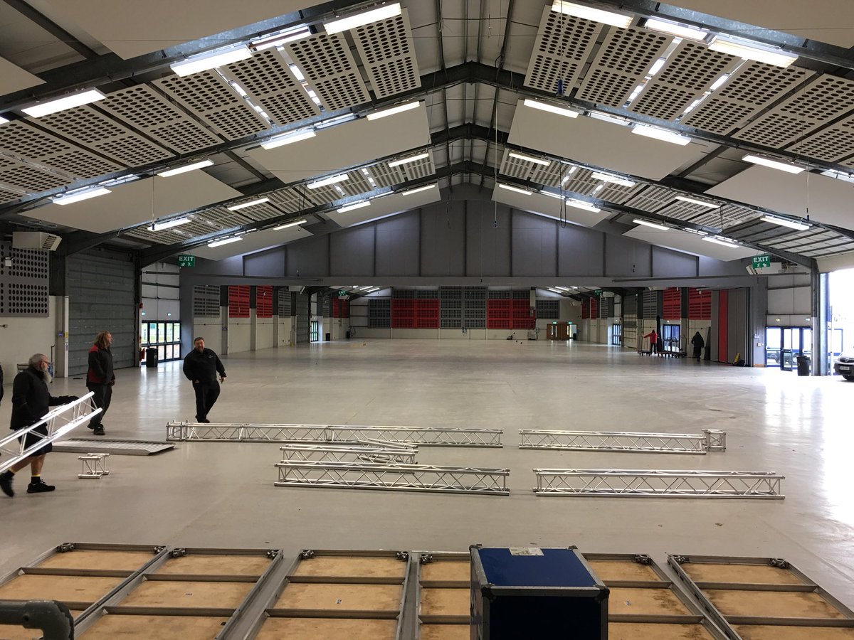CareNorfolk's tweet photo. Starting the build at the Norfolk Showground Arena for tomorrow’s Norfolk Care Convention. #carenorfolk https://t.co/nzBS8vV0Fk https://t.co/PLj2wKNeiu