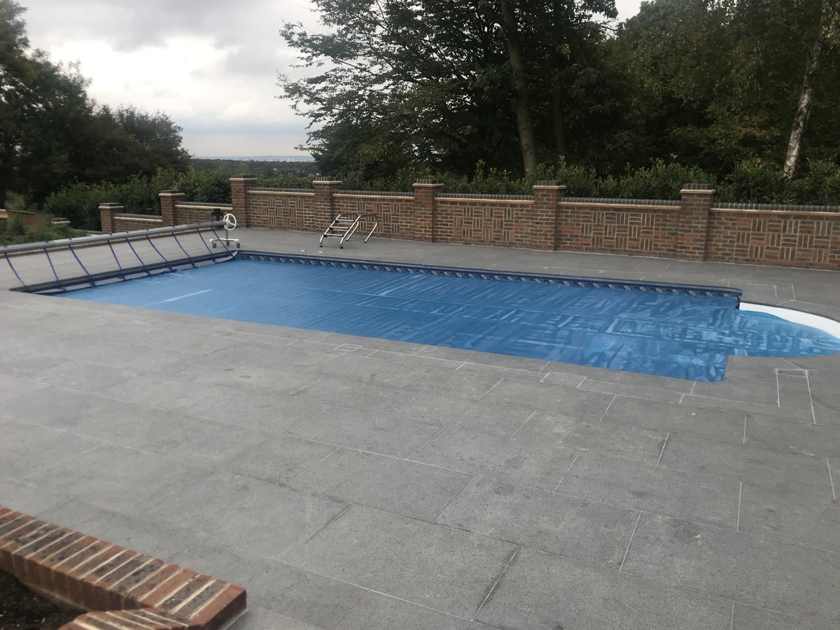 carrickgrass's tweet photo. One of our @Millboard_UK decking jobs with glass balustrade, swimming pool with patio surrounding and brick wall all installed by @carrickgrass https://t.co/zZjLr3me3N