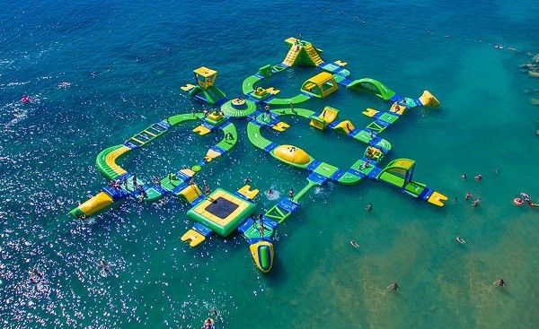 CFMonthly's tweet photo. A giant floating water park is officially coming to Lake Nona next summer ☛ https://t.co/CXvIe0SNYk #LakeNona https://t.co/0GB3n8F8b2