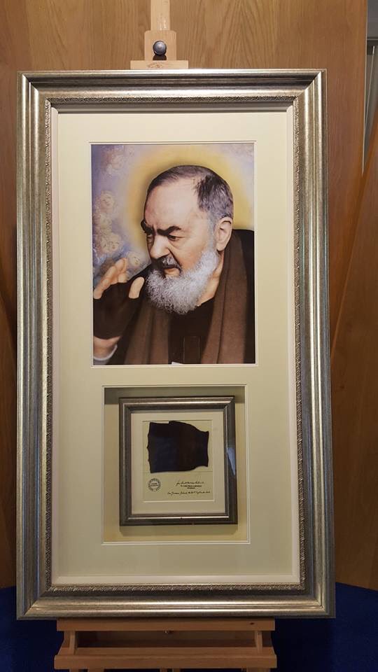 TheCrosshill's tweet photo. Our framing project:
A special frame was needed to display St Padre Pio’s image and glove. A door was provided at the back of the frame with security fittings to accommodate a padlock. The glove can now be removed when visiting the sick. https://t.co/4M2LTo3QoE