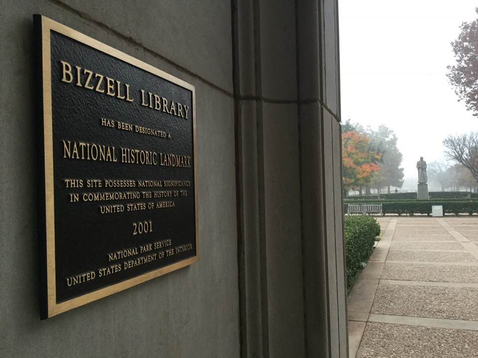 PalmeriJoAnn's tweet photo. Foggy fall morning @OU_Libraries: view from entrance with scene of south oval @UofOklahoma campus & status of former university President William Bennett Bizzell #histlib #libraries https://t.co/kC5UMMnASm