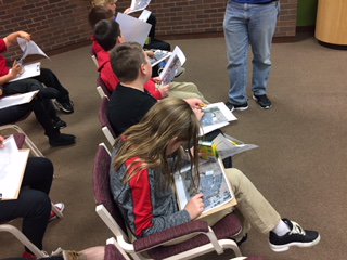 SethAStark's tweet photo. The 4th grade class at Decatur LSA had a great time learning about making maps from aerial photos yesterday for #GISDay! #GIS #maps #DecaturIL #geography https://t.co/oxPHYNfNIF