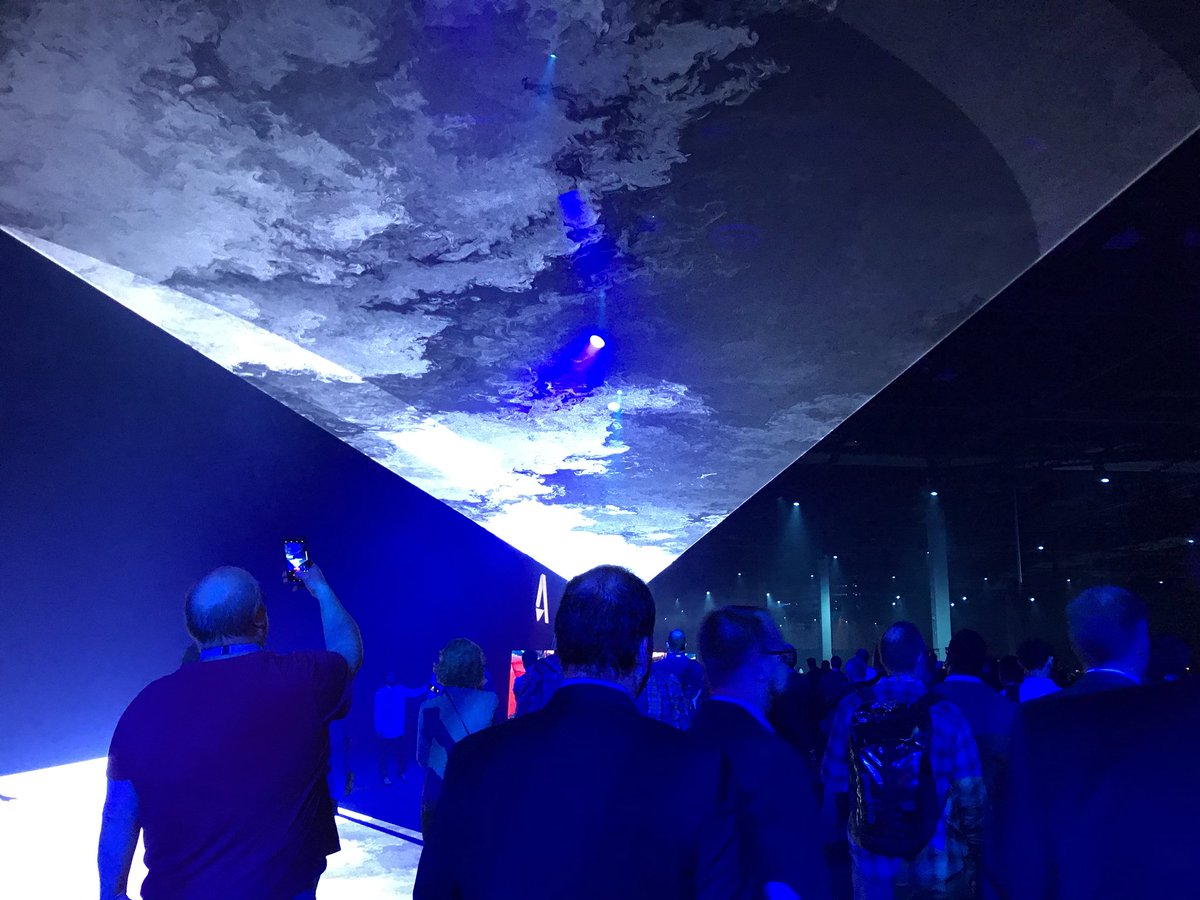 MightyDynamo's tweet photo. #AU2017 #keynote about to begin.   Impressive tunnel of huge-ass displays to get into auditorium. https://t.co/n6LtIMG2N7