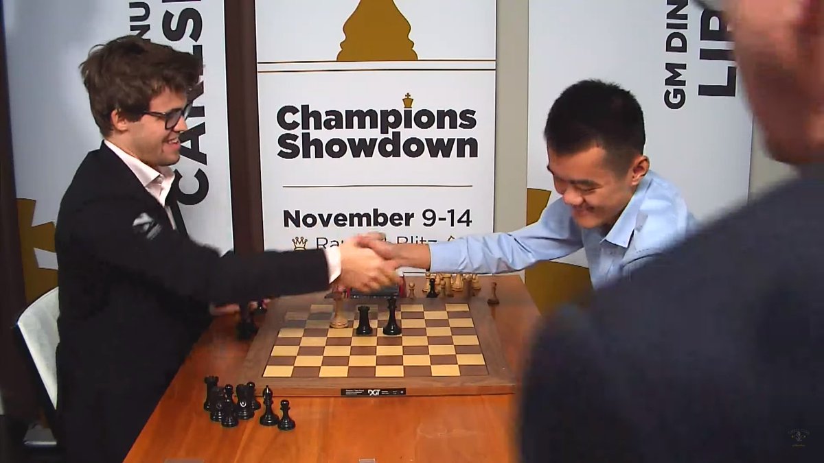 chess24.com on X: Both players see the funny side as @MagnusCarlsen flags Ding  Liren before he can give mate with R+K vs. K:   #c24live #ChampionsShowdown  / X