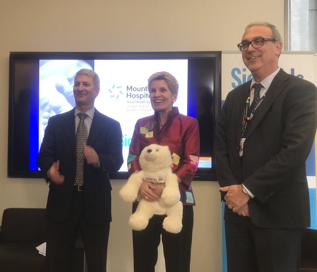 FraserGolding's tweet photo. Mt Sinai and SickKids celebrate a Canadian first in prenatal therapy with Premier Wynne.  A baby shower for the first baby undergoing spina bifida repair in the womb in Canada. This required a team of over 25 doctors, nurses, technologists and other health care professionals. https://t.co/NneEOgcuLQ