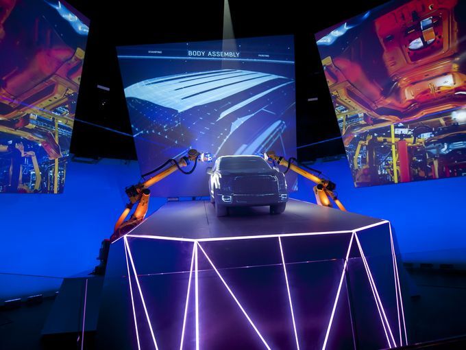 TechMDInc's tweet photo. Ford F150 Pickup Truck factory tour-Our task was to bring the truck alive by transforming the standard 3 projector theater into an immersive experience. Guests are cocooned in a Ford world. #techtuesday #techmdinc #aboveandbeyond #fordtruck #fordf150 https://t.co/ehR7nFxxDN
