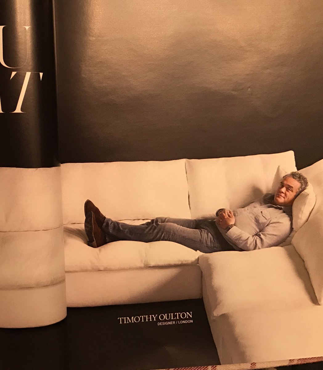 ashleyacox's tweet photo. The shoes on this white couch in the @RestoHardware catalog are elevating my blood pressure. https://t.co/kVlBgy0vI3