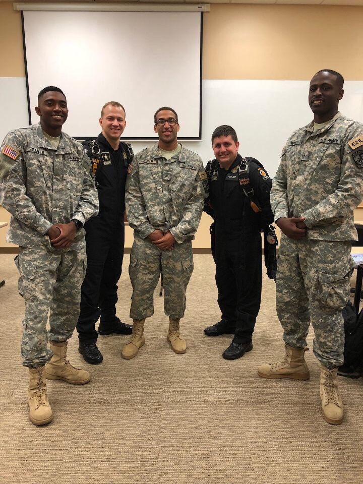 untarmyrotc's tweet photo. A special thanks to the Army Golden Knights parachute team for stopping by our ROTC classes to introduce themselves and what they’re all about. Keep an eye out for them as they parachute in on Saturday’s game as the Mean Green take on Army at Apogee Stadium! #GMG #Army #NewDenton https://t.co/C4qMRej4dL