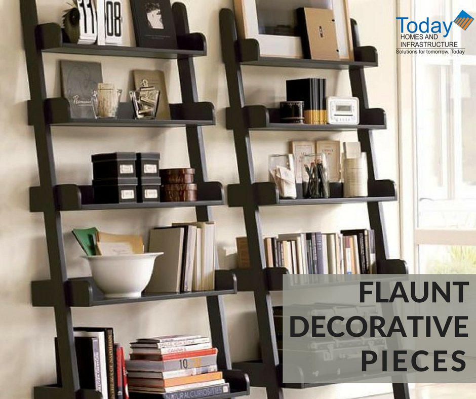 Use shelves to show off a collection of decorative objects and mementos. Stagger the shelves for a unique look. #TodayHomes #HomeTip