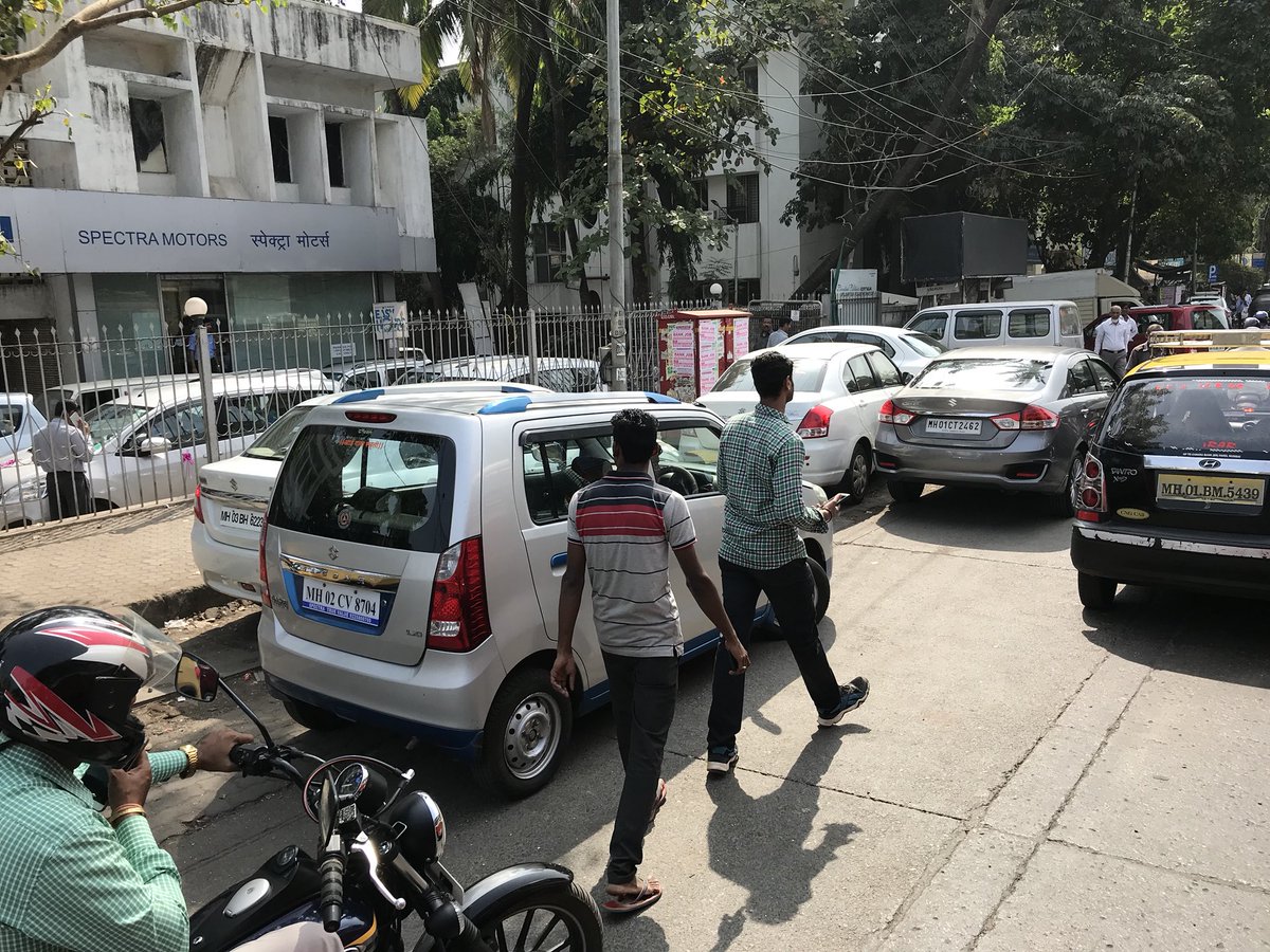 SunilGhate1's tweet photo. #LBS Rd Ghatkopar- Spectra motor’s blocks half of the road &amp; footpath forcing pedestrians on the fast lane. The bus stop isn’t spared either! Rule says vehicles cannot be parked within 15 metres from #BEST bus stop! @RidlrMUM @smart_mumbaikar @CPMumbaiPolice @ShivSena @BJP4India https://t.co/9cGIoGbNVX