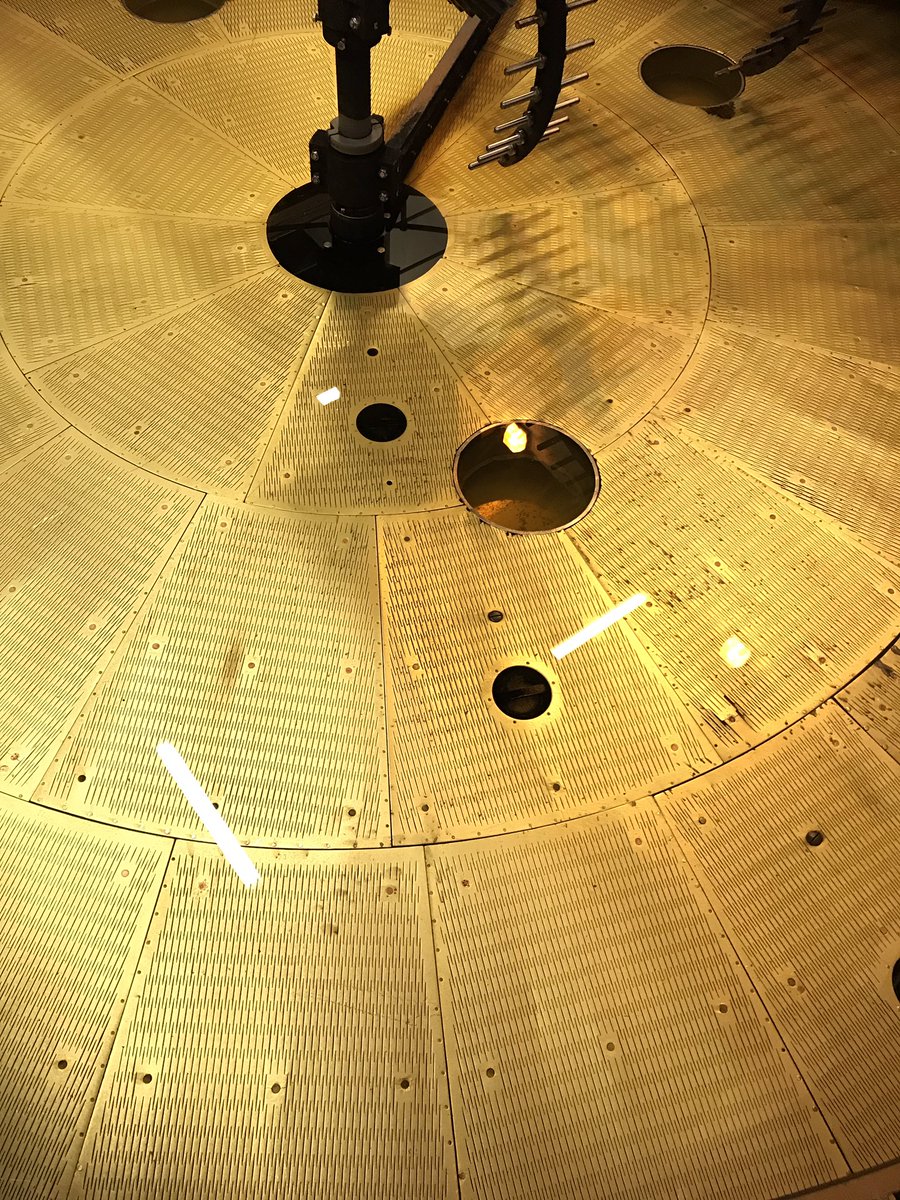 Bruichladdich's tweet image. Shining like the sun... Rab and Gillie have been cleaning the mashtun. That's all the sun we're getting in #islay today... #whiskyweather