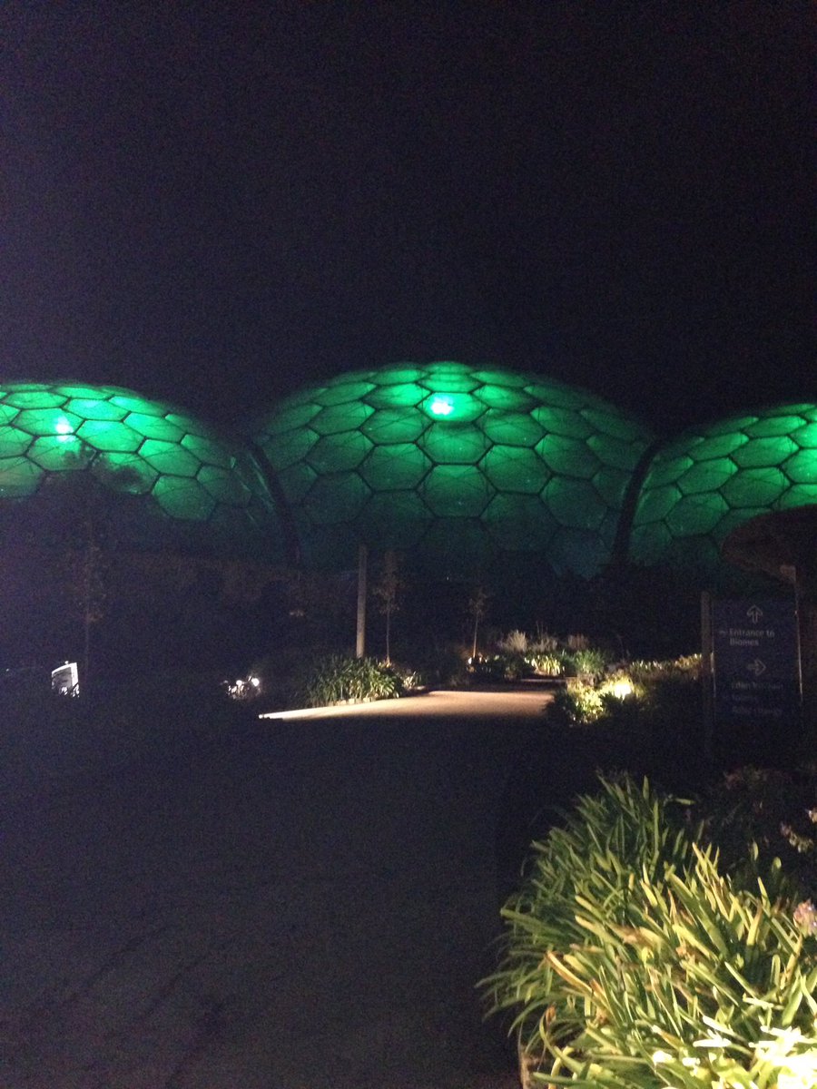 suzieatmac's tweet photo. The @edenproject biomes in @macmillancancer green for @MacmillanFair look absolutely fabulous - such an important event #makingadifference https://t.co/SfwQafadOa