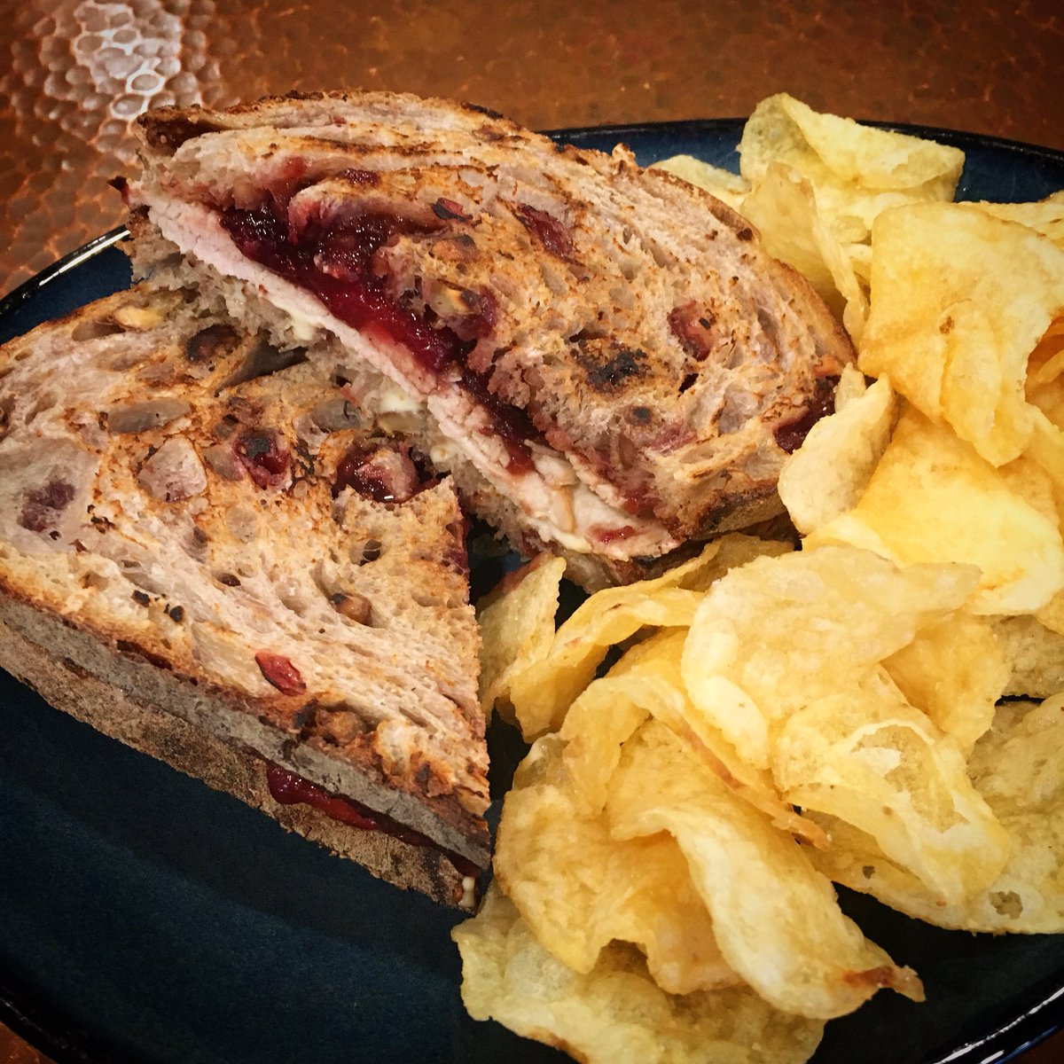 Here is one of our new items for the fall, the Cranberry Turkey sandwich! Filled with turkey, house made cranberry chutney, brie cheese spread and served on toasted <a href="/BrimfieldBread/">Brimfield Bread Oven</a> cranberry walnut bread! Check out our other new lunch/dinner items at artisancoffeeshop.com/menu
